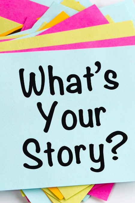 A stack of color post-it notes. The top one is blue with the words "What's Your Story?" written in black.