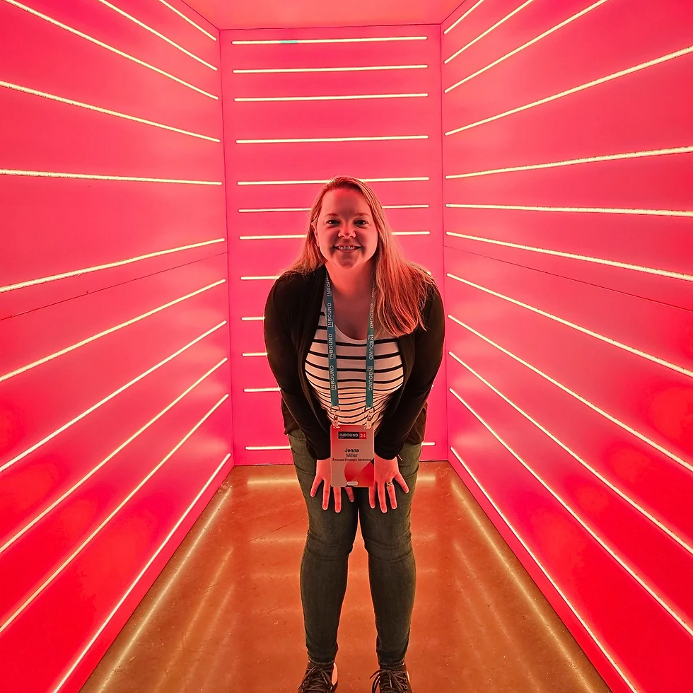 Emerald CEO Jenna Miller in a neon lit box at Inbound24