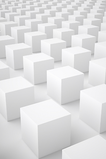 A white floor with white cubes sitting in neat rows across it. 