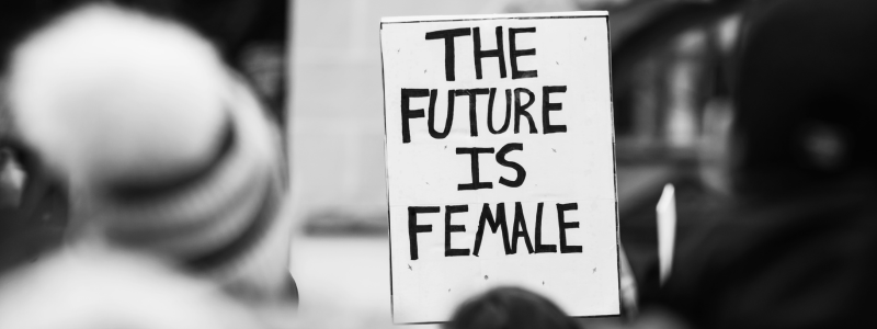 A sign that says, "the future is female"
