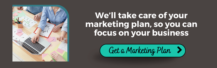 Marketing professionals at a desk working on a laptop. Text: We'll take care of your marketing plan, so you can focus on your business. Button: Get a Marketing Plan
