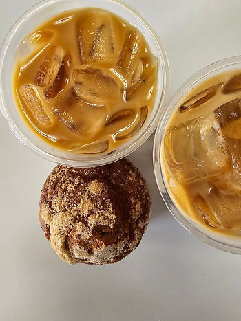 Two cups of iced coffee and a muffin